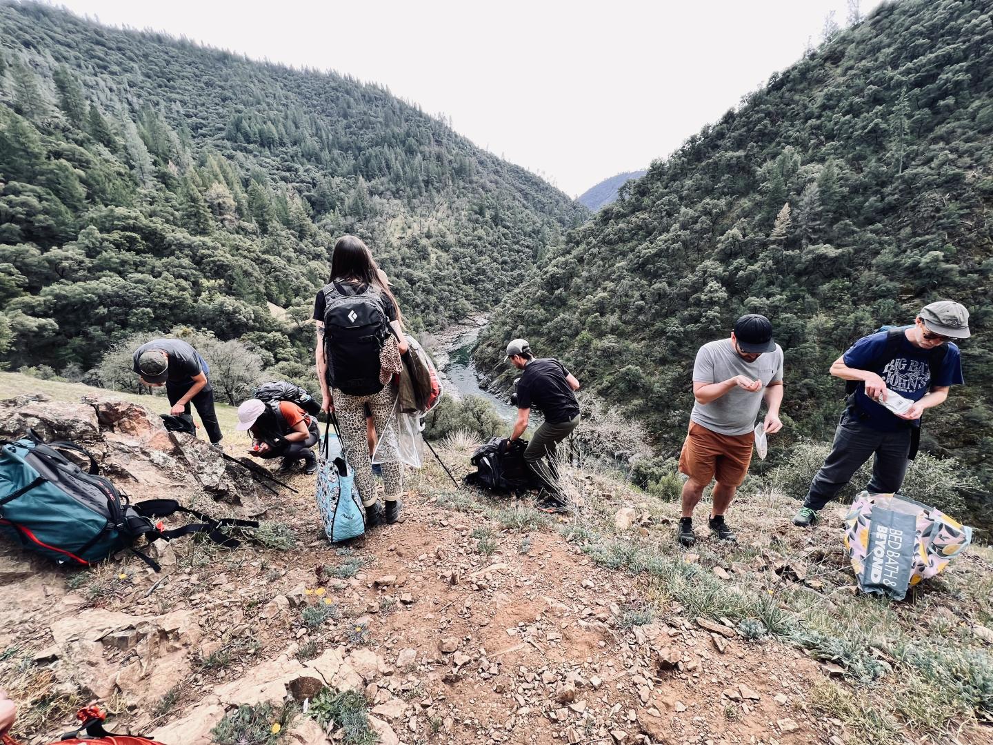 Group stopped on top of hill
